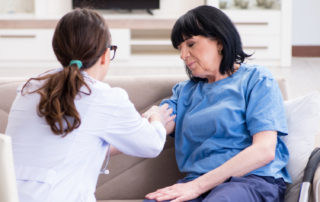 doctor treating patient