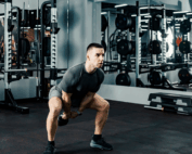 young athlete doing kettlebell swings