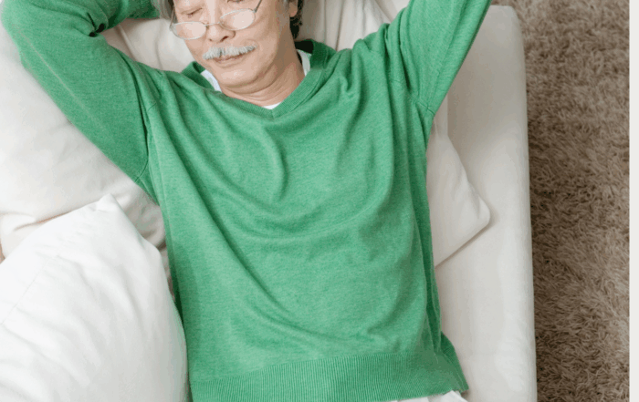 man sleeping on the couch