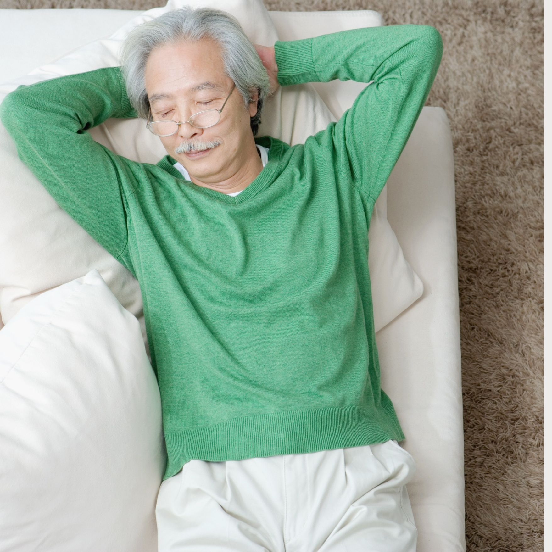 man sleeping on the couch